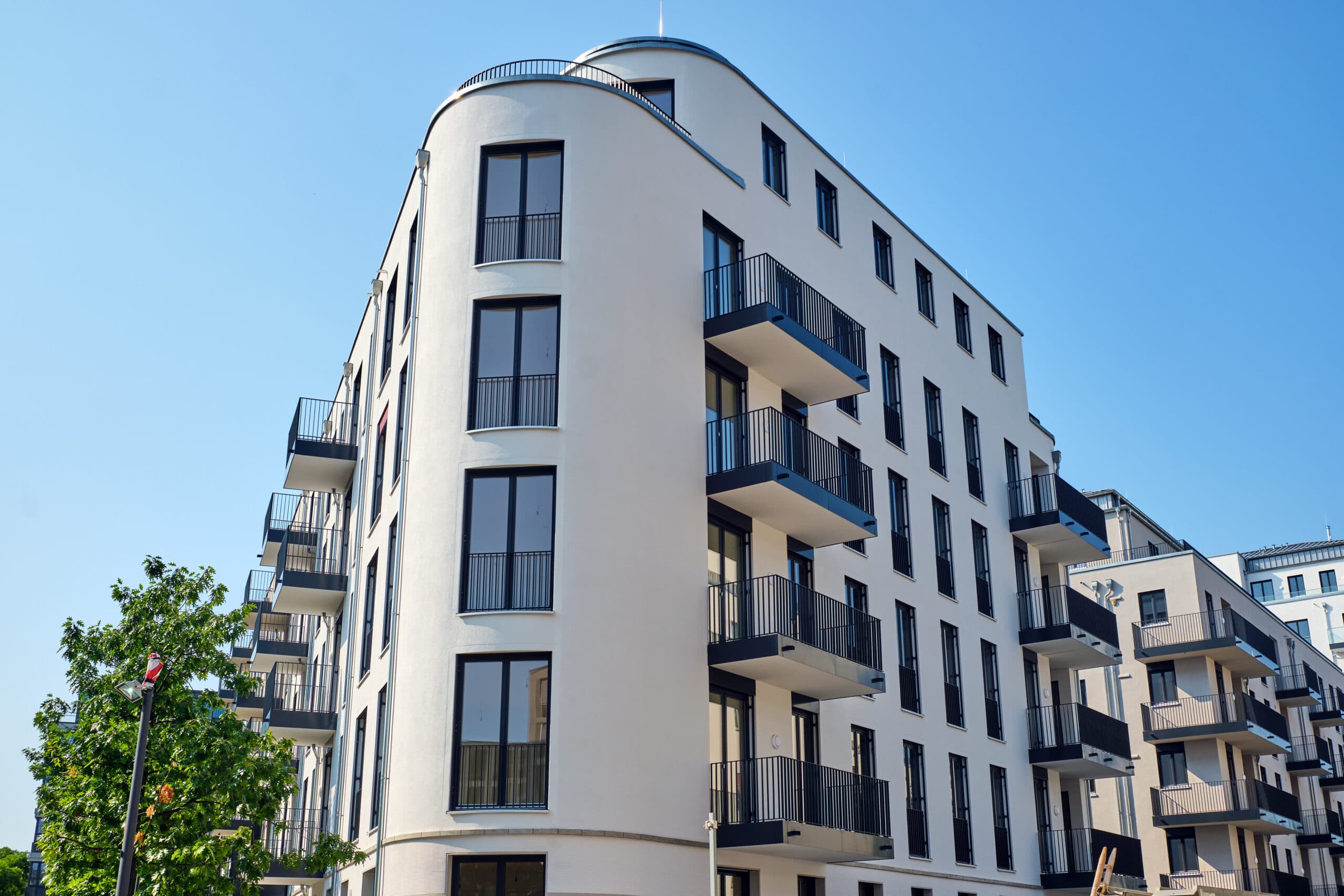 Modern apartment building with balconies maintained by Space Care property services